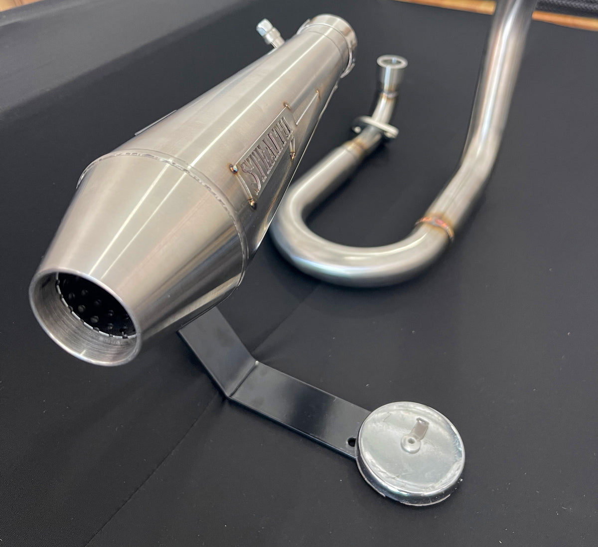 Close-up of Stealth x Kruesi Originals cone-style muffler for Honda Monkey exhaust system, photo 7 of 12