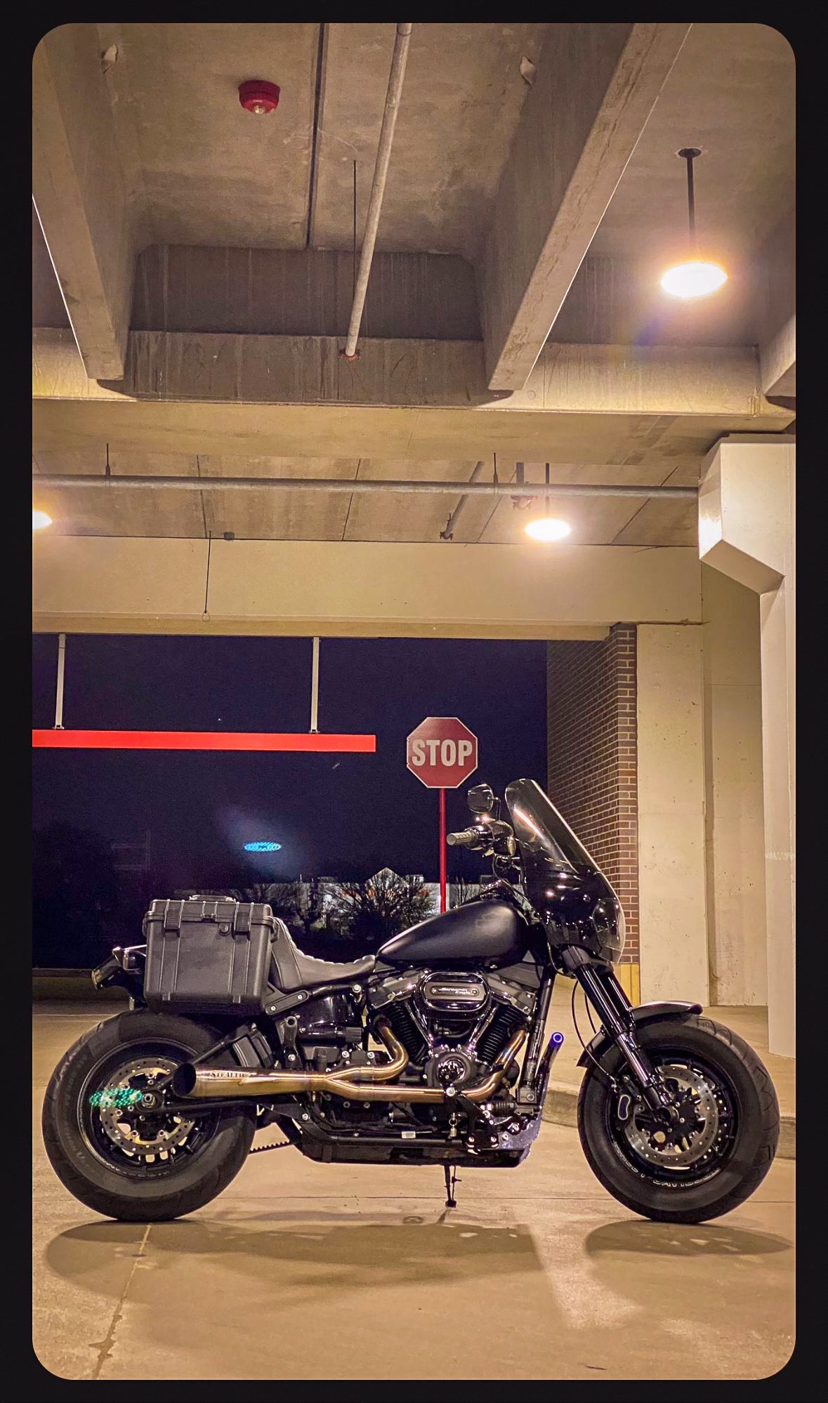 Stealth Pipes exhaust system installed on Harley M8 Softail – rear-side view of muffler and headers (2017–2025), photo 18 of 36