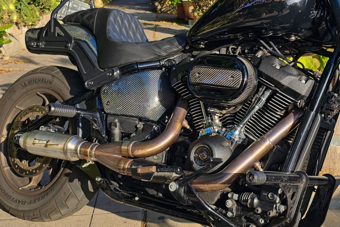 Stealth Pipes exhaust system installed on Harley M8 Softail – rear-side view of muffler and headers (2017–2025), photo 20 of 36