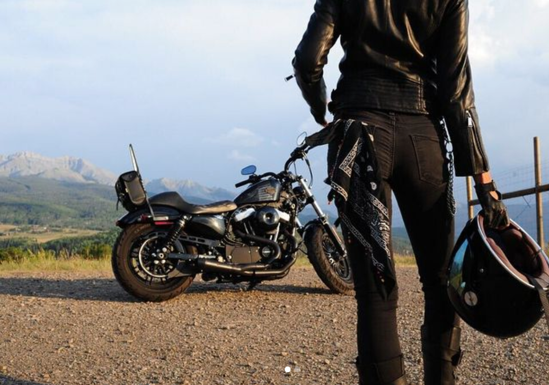 Harley Sportster motorcycle with Stealth Pipes exhaust – rider-side lifestyle photo, photo 7 of 12