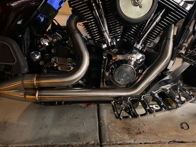 Stealth Pipes Short Bagger exhaust system – close-up rider side view on Harley touring motorcycle (1996–2016), photo 12 of 18
